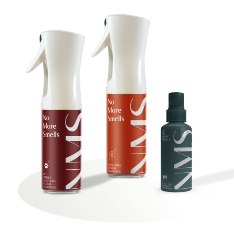 Three spray bottles of 'No More Smells' spray, including a small bottle, a medium bottle, and a large bottle, displayed with their respective labels.