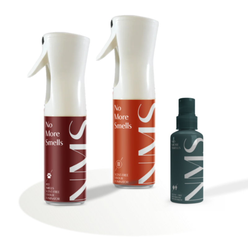 Three spray bottles of 'No More Smells' spray, including a small bottle, a medium bottle, and a large bottle, displayed with their respective labels.